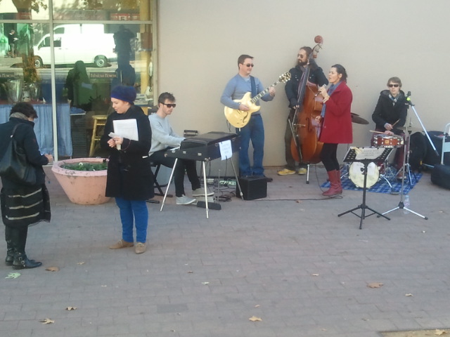 The protest spreads out into the city (with petition forms)