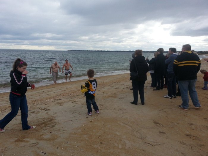 Craig Coombes and friend doing a bit of brass monkey work by swimming in and out of trunks at Mordialloc Beach in August!